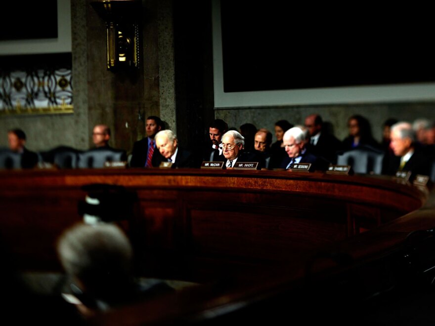 Sens. Joe Lieberman (I-CT, left), Carl Levin (D-MI, center) and John McCain (R-AZ), the ranking member of the Senate  Armed Services Committee, listen during a hearing about the  military's "don't ask, don't tell" policy Thursday on Capitol Hill.