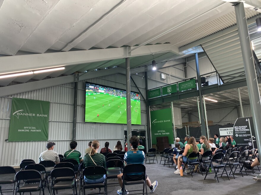 Crowd of people sit inside Athletic Club Boise watching Mexico V Czechia game