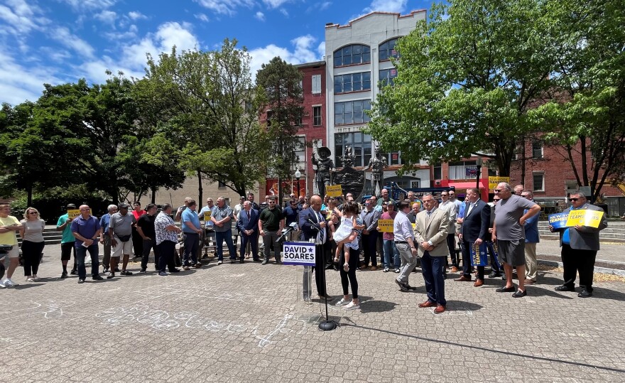 Albany County DA David Soares takes a last-minute glance at his notes before addressing a gathering of supporters at Albany's Tricentennial Square on Boradway, June 3, 2024.