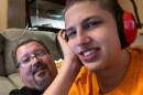Dan Miller, 57, and his son with autism Nathan Miller, 17, pose for selfies together in their house in Lake Worth, Fla. 