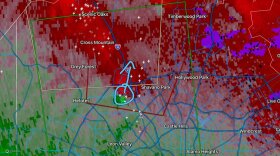 Radar velocity image from the National Weather Service Austin/San Antonio shows the tornado forming near IH10 and Loop 1604