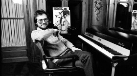 English-American musician, producer, and playwright Rupert Holmes (born David Goldstein) in front of a Fender Rhodes 'Eighty Eight' electric piano, during an interview (for Ad Lib magazine) at the Holmes Line Office, New York, New York, February 11, 1980.