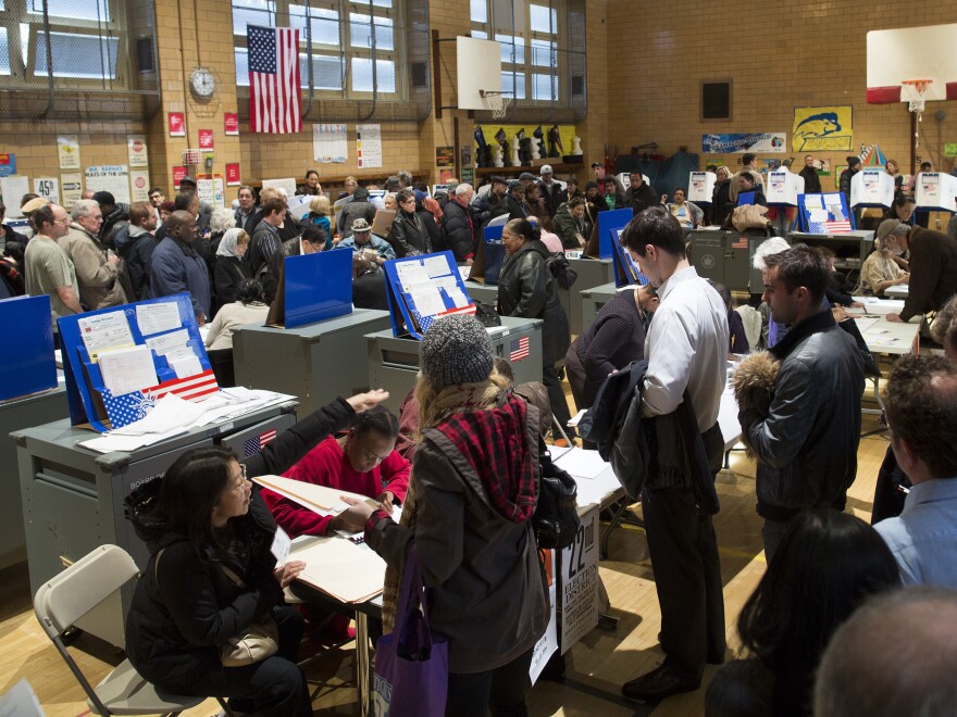 Voters wait for their chance to cast a ballot in the Chelsea neighborhood of Manhattan, Nov. 6, 2012, in New York.