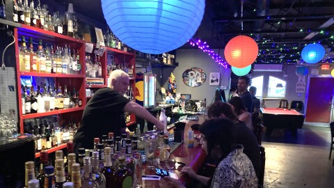 Manager Dan Friessen tends bar at Barbara's Pavilion. The bar won't be hosting any watch parties for the World Cup, but they are offering a safe, welcoming space for visitors during the Tournament.