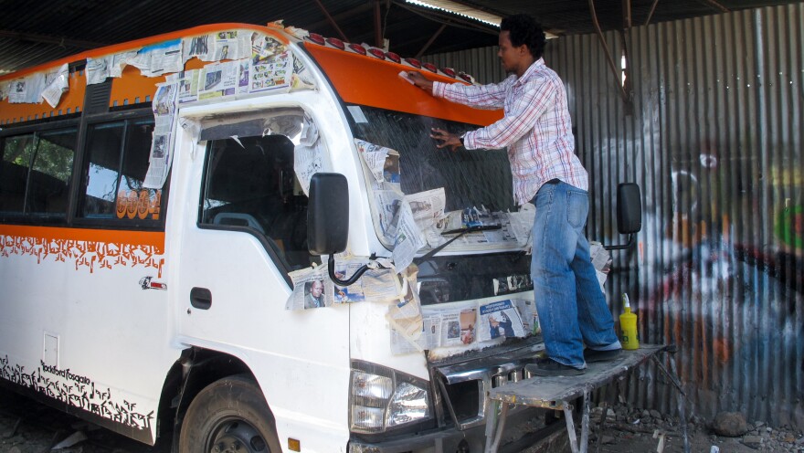 Roy Mungai (a.k.a. Great) adds color to the windshield.