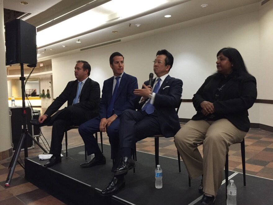 photo of a panel discussion of immigration issues