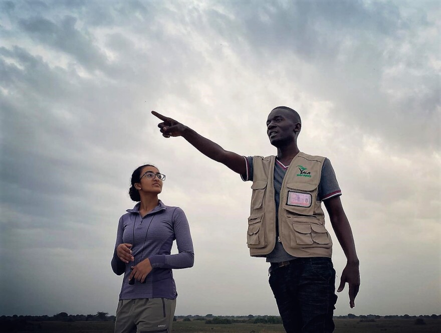 Sarrah listens to a guide at Queen Elizabeth National Park