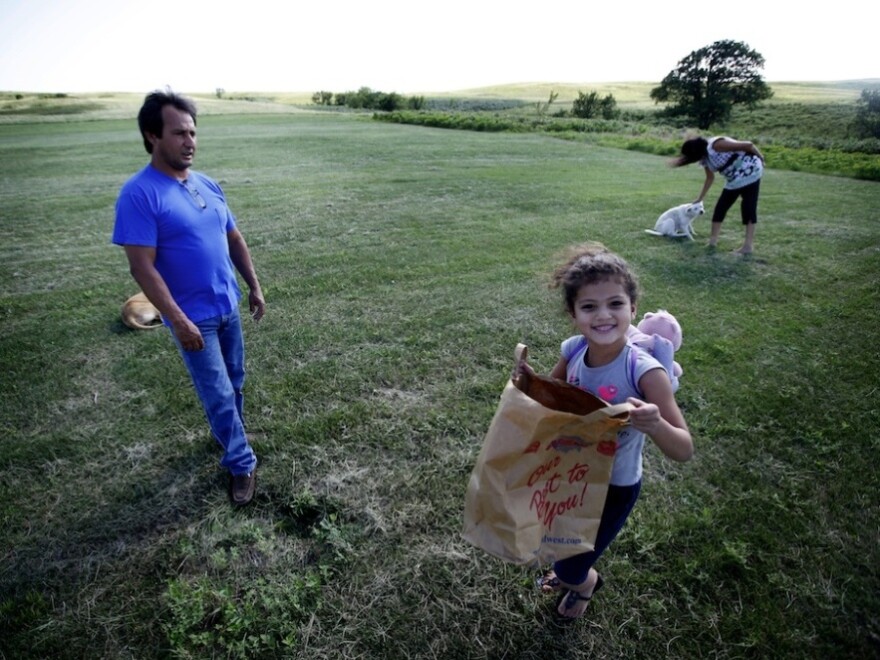 <p>Dwayne Stenstrom and his wife, Rose, live on South Dakota's Rosebud reservation, where they raised six children. Also pictured is their granddaughter.</p>