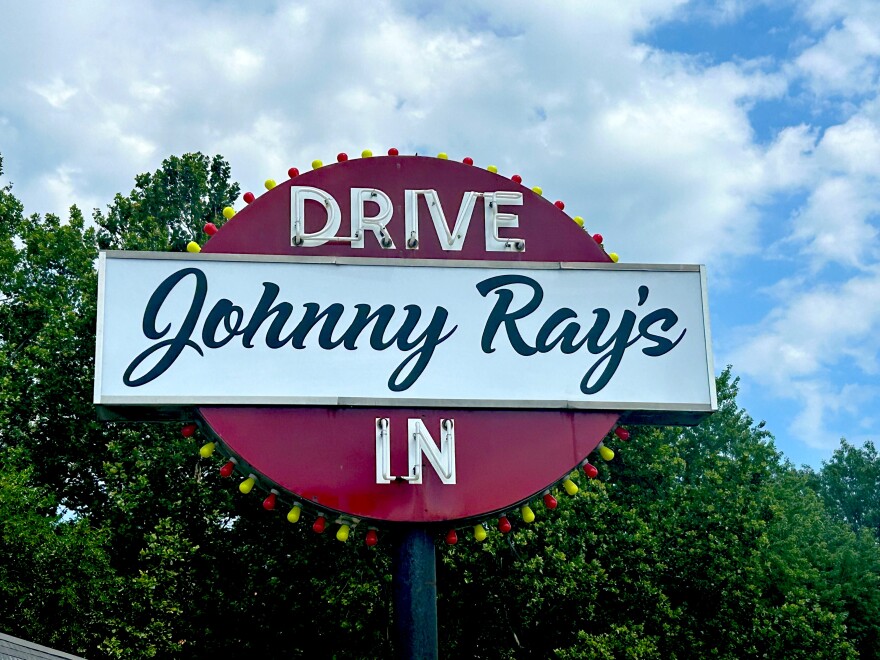 The red, white and black sign for Johnny Ray's Drive-In.
