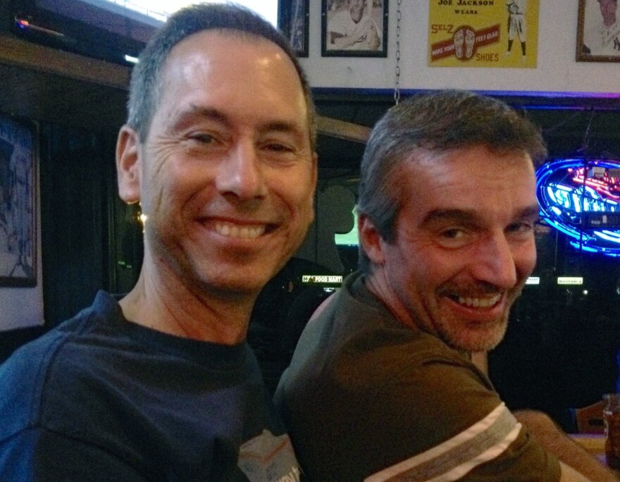 Jim Weaver and Rich Baumiester smile while they enjoy drinks together at a bar. The couple look forward to getting married Aug. 29 in Florida.