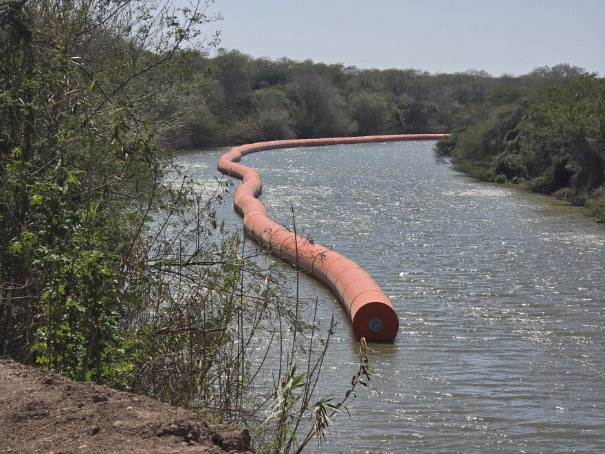 A string of buoys in the Rio Grande near Brownsville Texas.