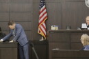 Assistant State Attorney Ryan Nagel shows evidence to Ian “Bob” Munnerlyn during his testimony Wednesday, Sept. 23, 2026. Munnerlyn and his girlfriend, Christin Cassels, lived together at the time of her 2017 killing. (Katie Klaiber/WUFT News)