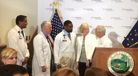Community Health leaders join state officials for an announcement about the neonatal program.