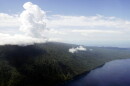 FILE - Steam billows from Lake Vui in the volcano crater of Mount Manaro on the island of Ambae, part of the Vanuatu islands chain, on Dec. 8, 2005.