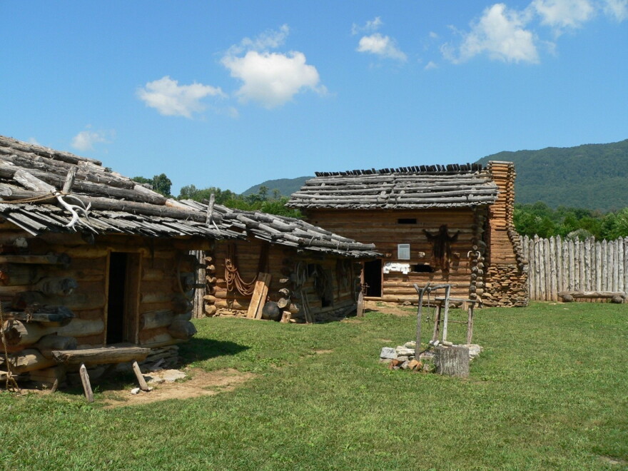 Inside the reconstructed Martin's Station fort at Wilderness Road State Park in Virginia. Martin’s Station was near Ruddell’s Station and was attacked and breached two days later. George Lail and many others were taken from Ruddell’s Station. Cmadler, Own Work under: https://en.wikipedia.org/wiki/GNU_Free_Documentation_License.
