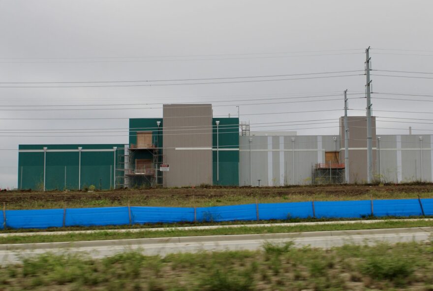 Panasonic officials say it is difficult to say when the DeSoto plant will reach full production because there are many factors in play.