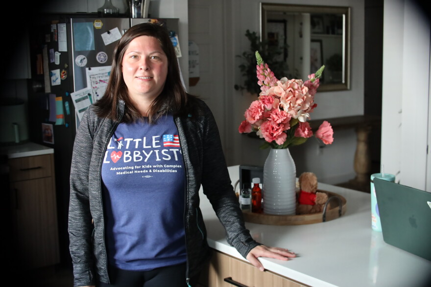 Melissa Sabin, an advocate with Little Lobbyists, stands in her kitchen in Shawnee, Kansas, on Oct. 5, 2026. Sabin’s own experience with her son, Logan, who has a disability, encouraged her to join the organization to help families like hers.