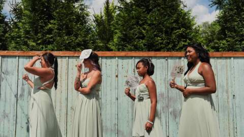 Bridesmaids wait to take photos on Aug. 23, 2025, in Newtown, Ohio. (Joshua A. Bickel/AP)