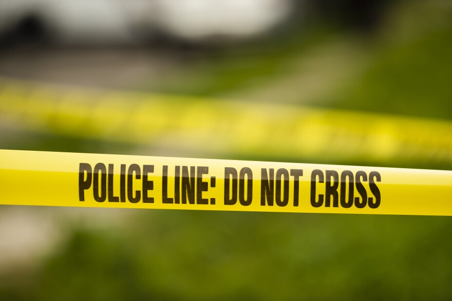 Tape cordons off a crime scene.