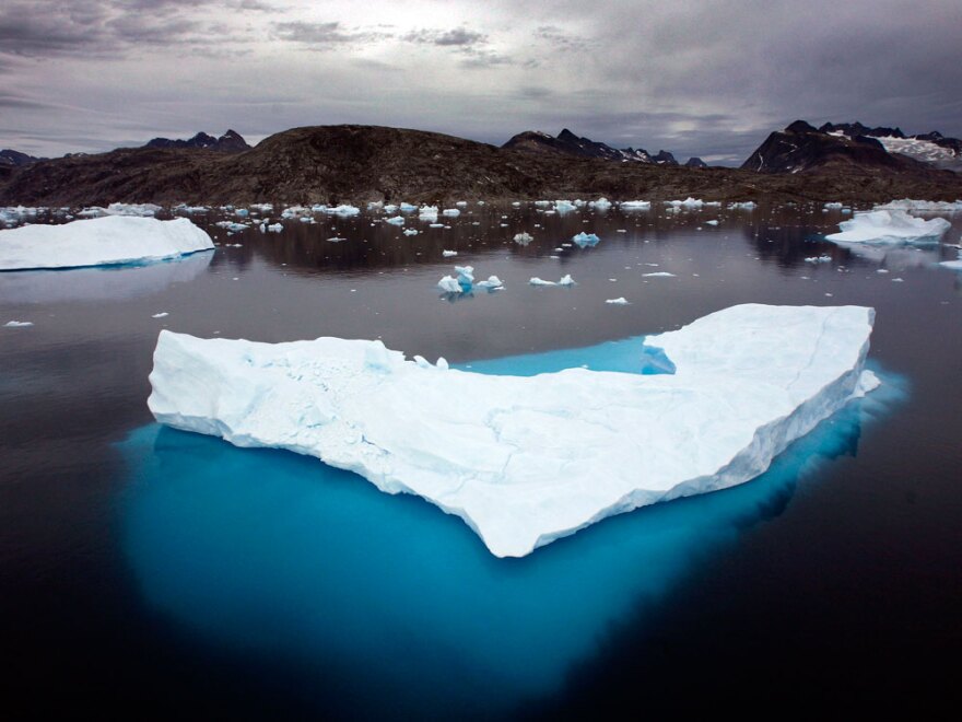 Icebergs float in a bay off Ammassalik Island, Greenland.