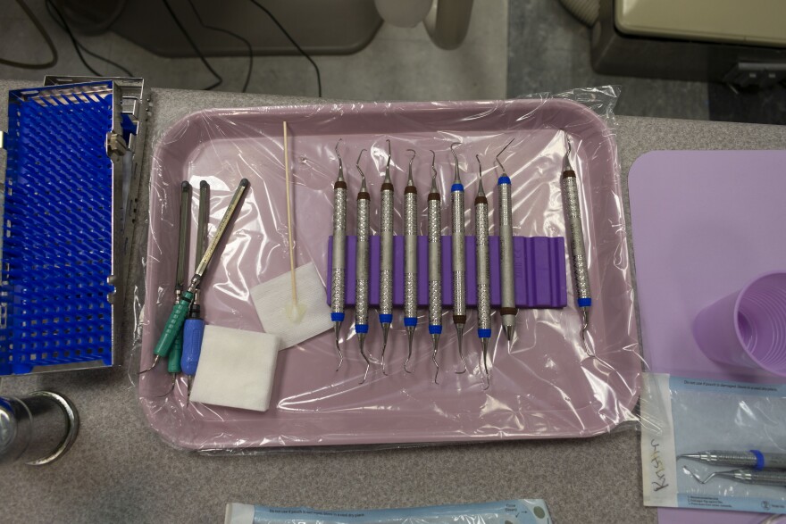 A tray of dental equipment.