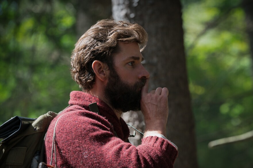 In <em>A Quiet Place, </em>John Krasinski plays Lee Abbott. The movie follows a family that lives in a post-apocalyptic world, where super-hearing creatures will kill them in they make a sound.