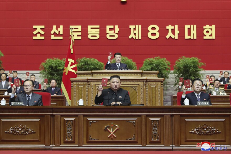 In this photo provided by the North Korean government, North Korean leader Kim Jong Un attends a ruling party congress in Pyongyang on Jan. 12, 2021. North Korean hackers have stolen an estimated 1.5 trillion won ($1.2 billion) in cryptocurrency and other virtual assets in the past five years, South Korea's spy agency said Thursday.