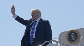President Donald Trump waves as he walks off Air Force One at Groton-New London Airport in Groton, Conn., Wednesday, May 17, 2017. (AP Photo/Susan Walsh)