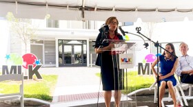 State Department of Housing Commissioner Seila Mosquera-Bruno at the podium during the reopening of Hartford’s MLK apartments in the city’s Sheldon Charter Oak neighborhood. The apartments are reserved for families who earn at or below 60% of the Area Median Income (AMI) according to the Commissioner.