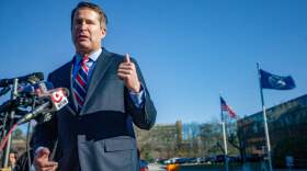 Congressman Seth Moulton speaks to the news media and describes what he witnessed during his visit at to the ICE Boston Field Office in Burlington. (Jesse Costa/WBUR)