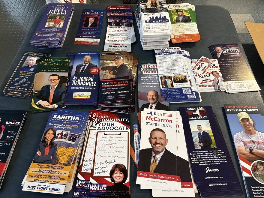 Campaign pamphlets cover a table at GOP Committee headquarters in Syracuse.