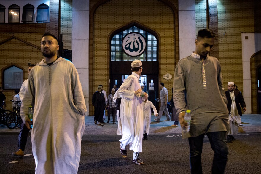 Members of the Muslim community leave the East London Mosque after prayers before the start of the holy month of Ramadan in June 2014. The mosque has an estimated 7,000 worshippers.