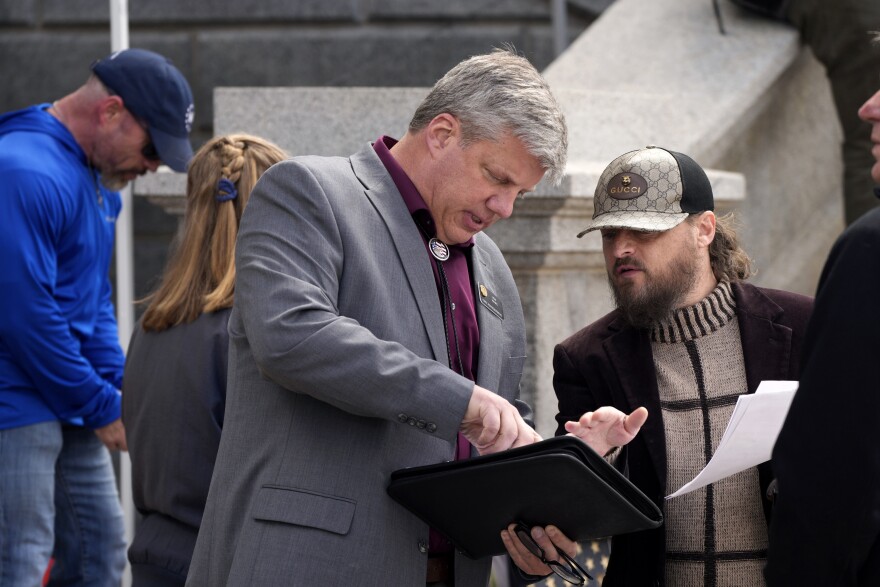 Colorado State Rep. Ron Hanks, R-Canon City, attends a rally calling for free and fair elections in Colorado Tuesday, April 5, 2022, on the west steps of the State Capitol in downtown Denver. Colorado’s top Republican primary contests for U.S. Senate, secretary of state and governor will be held Tuesday, June 28.