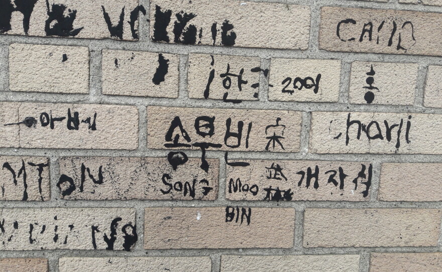 Detainees wrote their names or the name of their home countries.