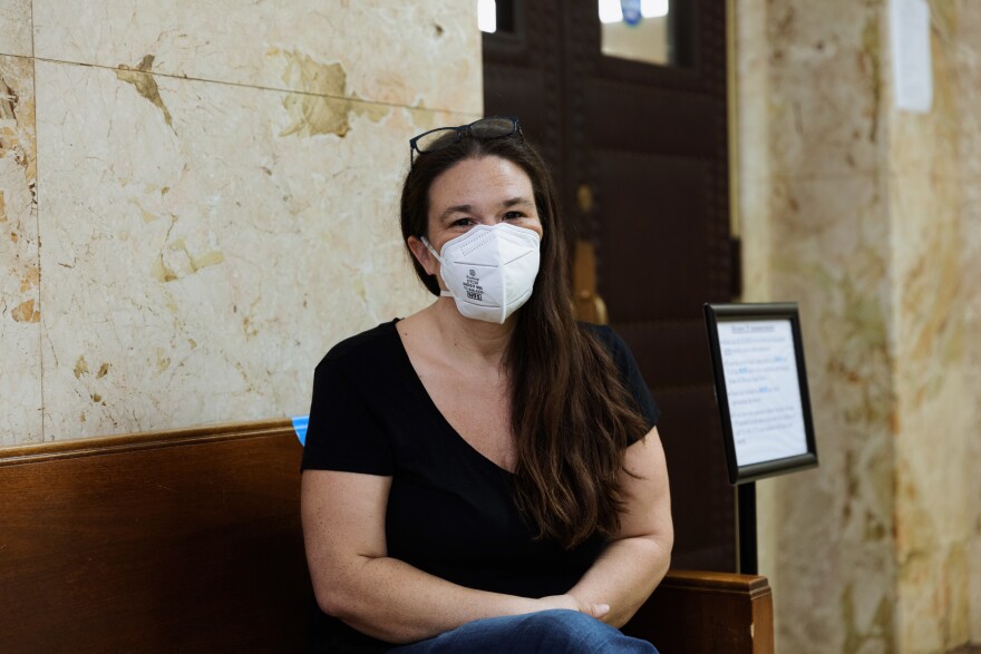 Jennifer Bosley awaits her eviction hearing at the Jackson County Courthouse.