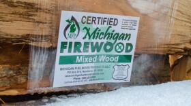 Packages of certified Michigan firewood being sold outside a service station in Mackinac County. (John Pepin/Michigan Department of Natural Resources)