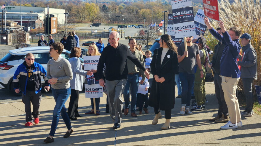 U.S. Sen. Bob Casey and his family arrive to vote at Scranton High School on Tuesday morning.