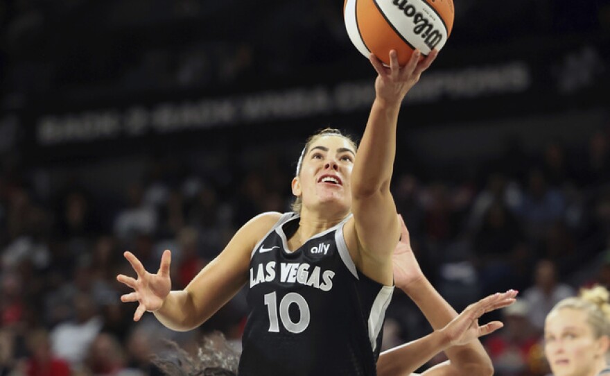 Las Vegas Aces guard Kelsey Plum (10) shoots during a WNBA basketball semifinal game against New York , Friday, Oct. 4, 2024, in Las Vegas.