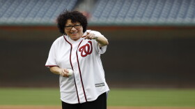 U.S. Supreme Court Justice Sonia Sotomayor prepares to throw out a ceremonial first pitch before a baseball game between the Philadelphia Phillies and the Washington Nationals, Thursday, Sept. 26, 2019, in Washington. 