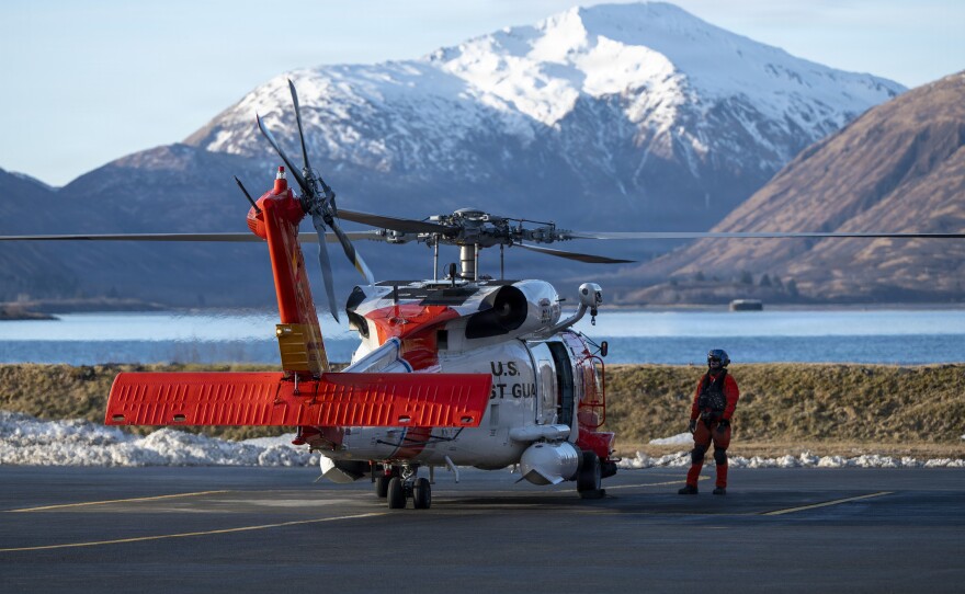 A U.S. Coast Guard MH-60 Jayhawk helicopter prepares to take off during a simulated ship-to-shore patient transport as part of ARCTIC EDGE 2026, demonstrating collaborative medical training and knowledge exchange across the U.S. Coast Guard, Navy, and Air Force at Kodiak, Alaska, Feb. 24, 2026.