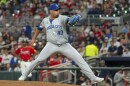 Kansas City Royals pitcher Carlos Hernández throws in the eighth inning of a baseball game against the Atlanta Braves, Friday, Sept. 27, 2024, in Atlanta.