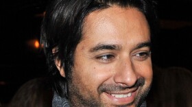 Former CBC host Jian Ghomeshi was arrested Wednesday and charged with four counts of sexual assault and one count of overcoming resistance by choking.