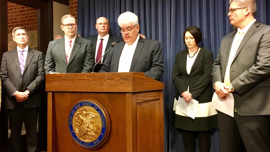 Art Ryan, superintendent of Cahokia schools, addresses media with other superintendents who are plaintiffs in a lawsuit against Gov. Bruce Rauner and the State Board of Education.