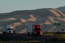 Freight trucks travel northbound on Interstate 5 Highway, Wednesday, Sept. 3, 2025, in Tracy, Calif.