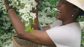 Shalina Rankin at work in her herbal garden.