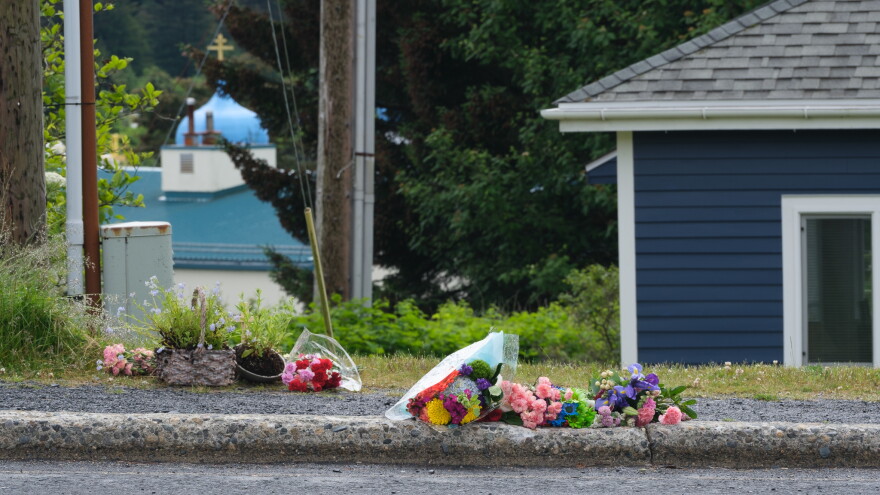 Some people have set flowers down near where they believe the victim was found, July 17, 2023. (Brian Venua/KMXT)