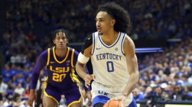 Kentucky's Jacob Toppin (0) looks for an opening on LSU's Derek Fountain (20) during the second half of an NCAA college basketball game in Lexington, Ky., Tuesday, Jan. 3, 2023. Kentucky won 74-71. (AP Photo/James Crisp)