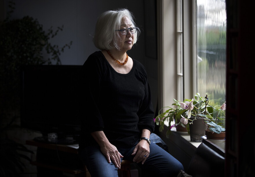 Mayumi Tsutakawa poses for a portrait on Friday, December 1, 2017, at her home in Seattle. 