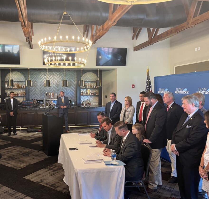  Gov. Andy Beshear (D) and legislators including Jonathan Rabinowitz and Michael Meredith (R-19) sign emergency regulations paving the way for sports betting at the Red Mile in Lexington Monday afternoon.