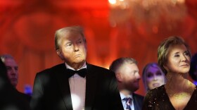 President-elect Donald Trump listens with Linda McMahon during an America First Policy Institute gala at his Mar-a-Lago estate, Thursday, Nov. 14, 2024, in Palm Beach, Fla. (AP Photo/Alex Brandon)